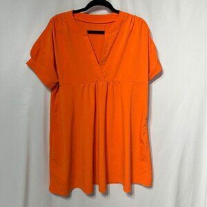 Woman’s orange sundress. Adorable!! Size large. Short sleeve.